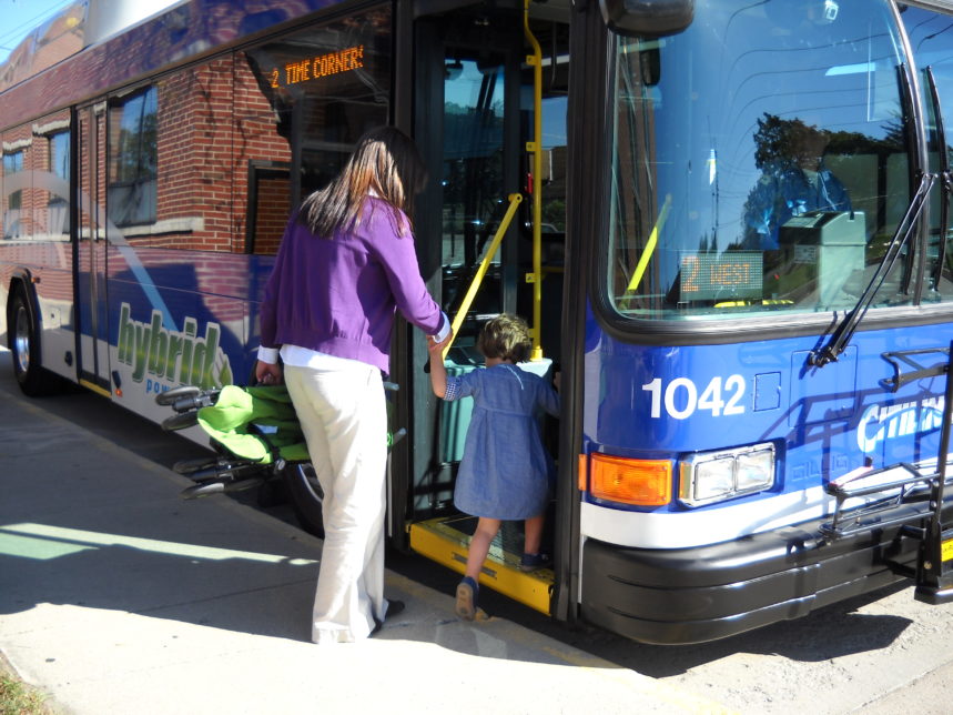 People getting on bus