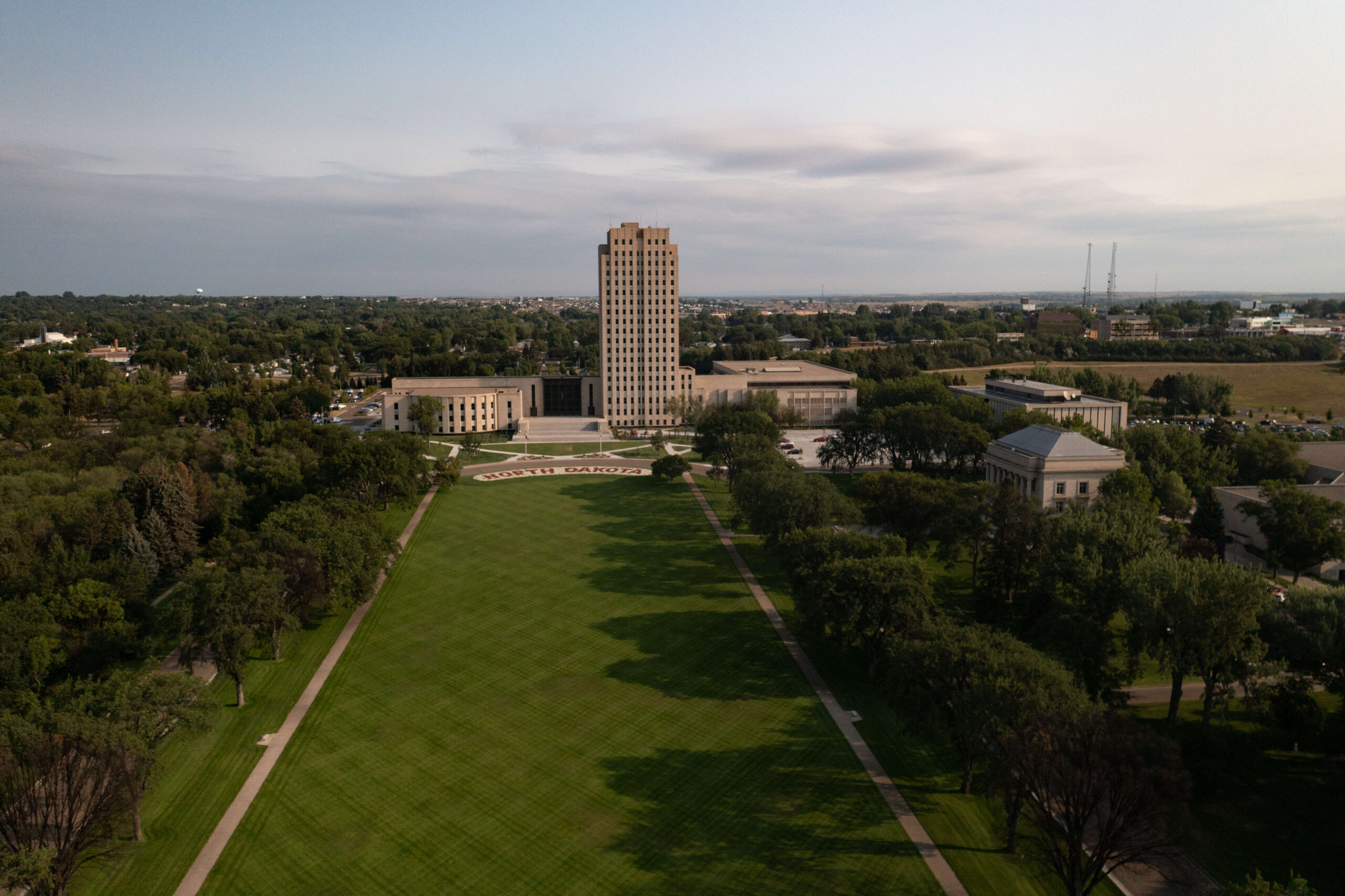 Bismarck skyline banner image aerial view of the North Dakota State Capital, featured on the SRF Consulting Bismarck page, representing the firm’s engineering, planning, and design services in Bismarck, North Dakota.