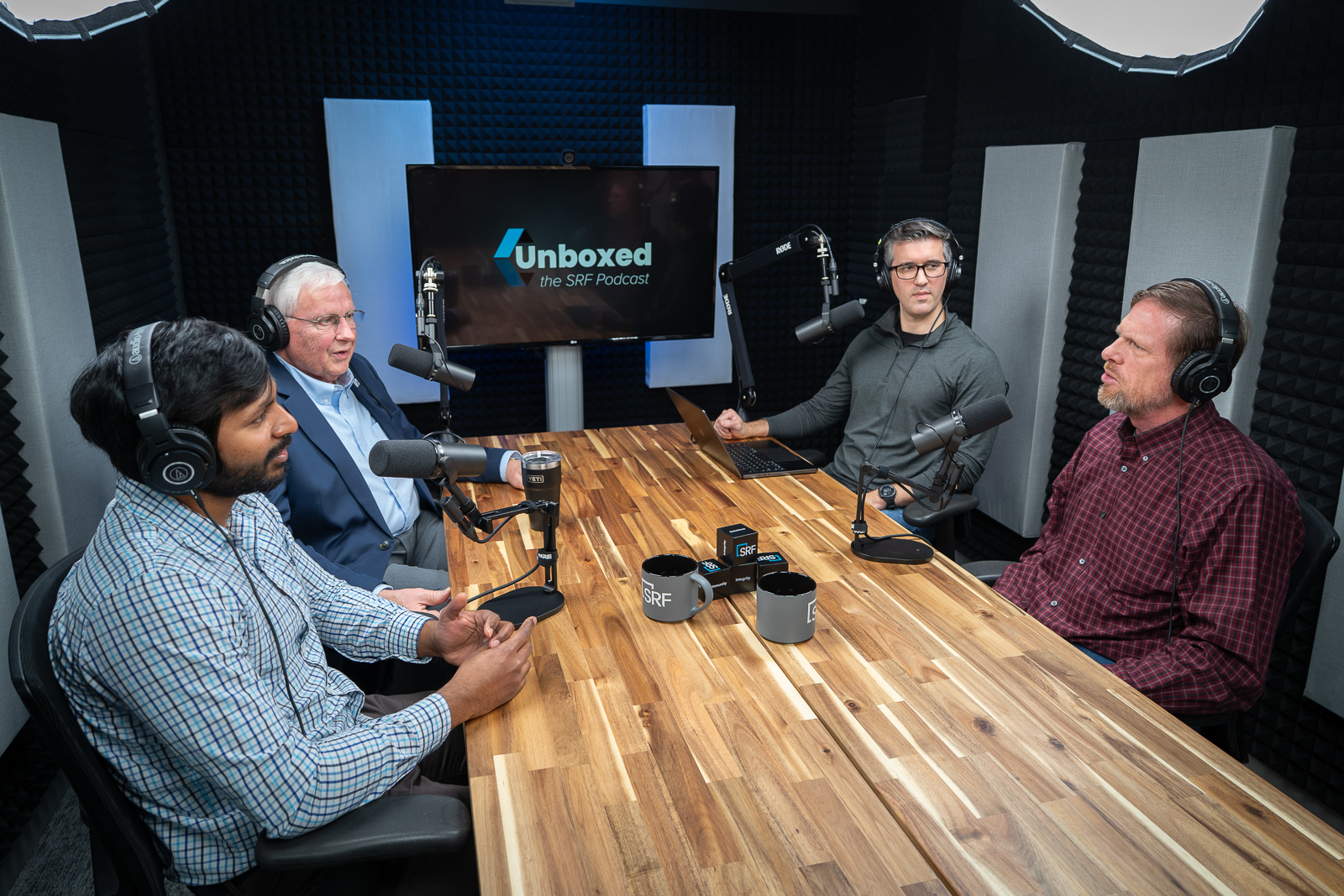 SRF staff recording a podcast episode in the SRF Multimedia Studio.